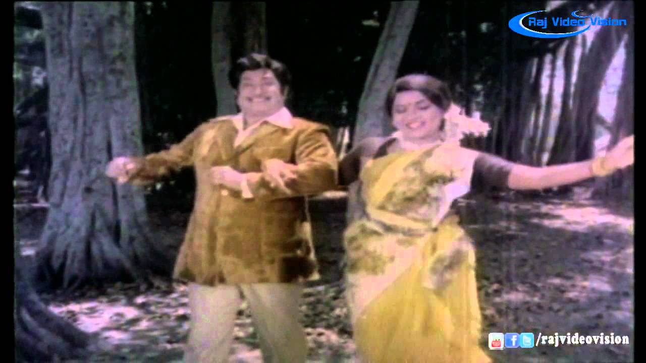 Mazhai Vizhundhadhu Song Lyrics – Yemanukku Yeman poster