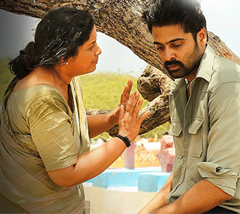 Thaayai Thedi poster